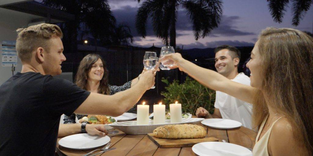 couples cheers on patio